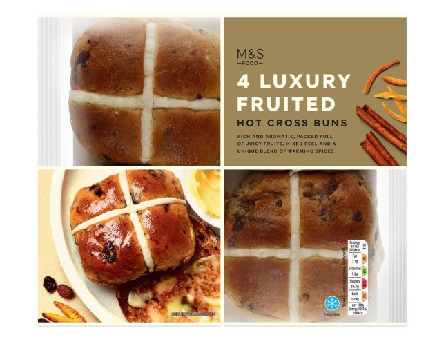 M&S Luxury Fruited Hot Cross Buns in a pack of four on a white background