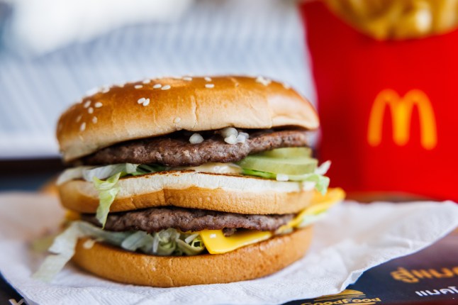 A Big Mac from McDonald's and fries on a table