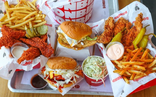 A tray of food from BonBird, including chicken burgers, fries, and chicken tenders