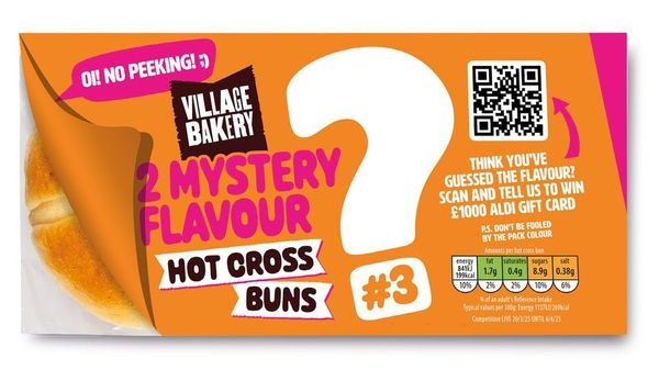 A packet of Aldi's Village Bakery mystery hot cross buns #3 on a white background