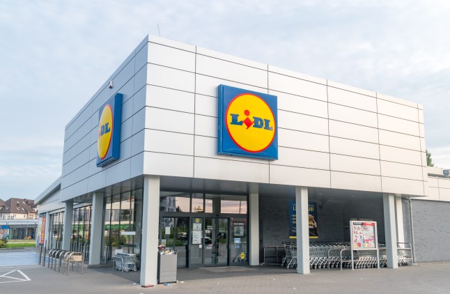 A Lidl supermarket view from outside with the sky in background