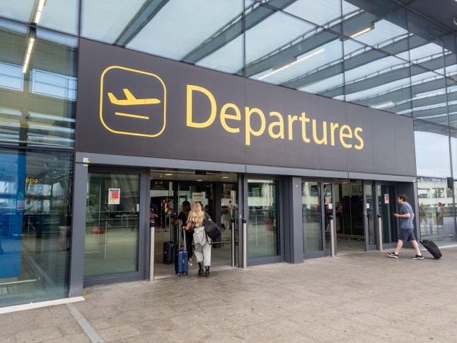 The sign for the departure hall of London Gatwick Airport's north terminal building.