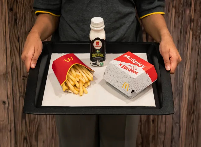 McDonald's McSpicy x Frank's RedHot meal on a tray