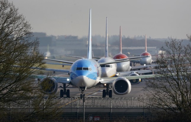 Planes queue for take off at London Gatwick Airport