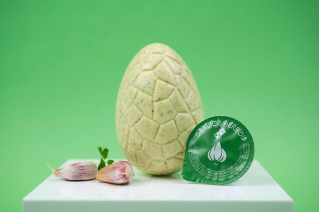 Domino's Garlic & Herb Easter Egg pictured with a 25g pot of sauce.