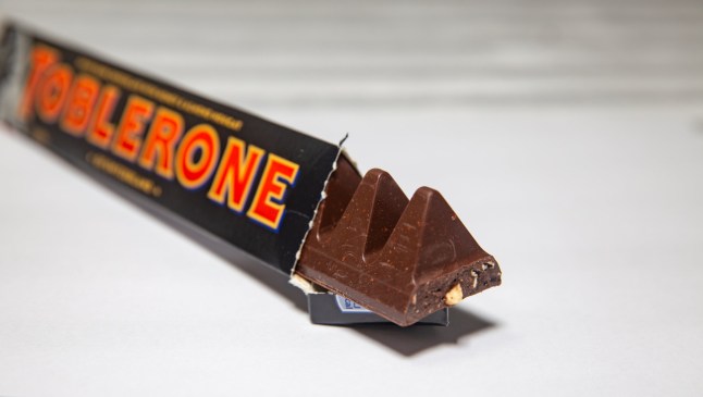 Brasilia, DF, Brazil, February 21, 2023: Traditional dark toblerone chocolate isolated in selective focus; Shutterstock ID 2265089407; purchase_order: -; job: -; client: -; other: -