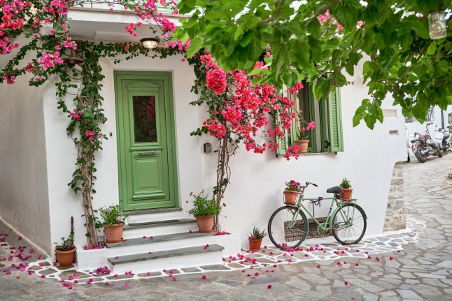 Beautiful view on the bike and the house on the island of Skiathos