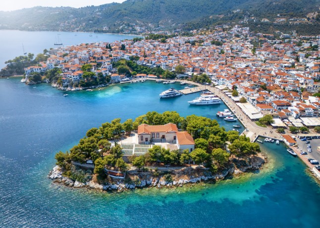 An aerial view of Skiathos town, with its old port and the Bourtzi peninsula in Greece.