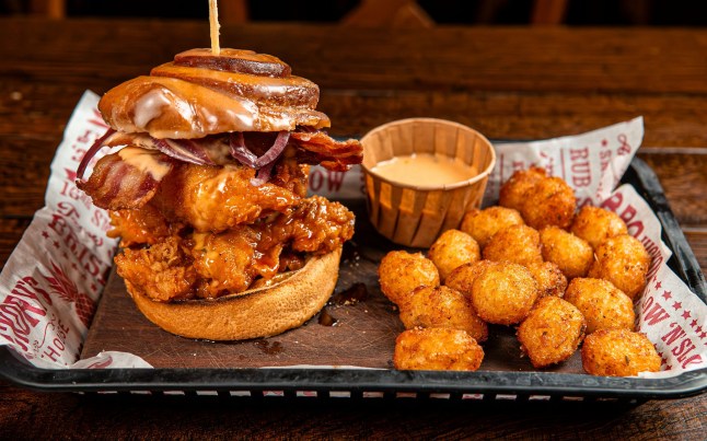 A burger on a tray at Hickory's Smokehouse.