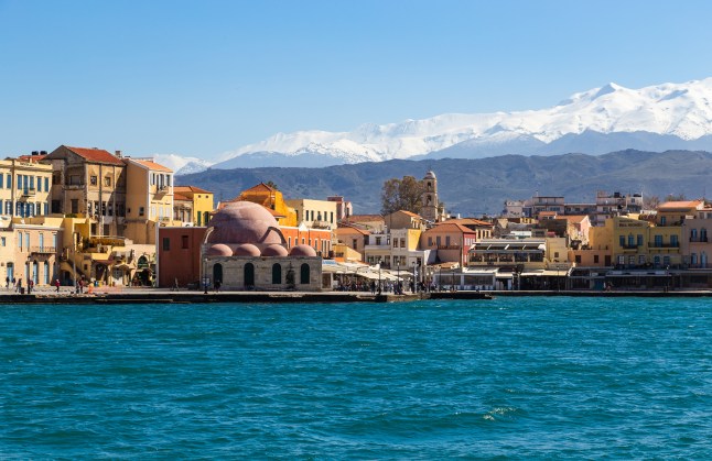 Old town, Chania, Crete, Greece in front a snow covered mountains