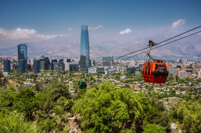 A cable car over a forest on the outskirts of Santiago, Chile