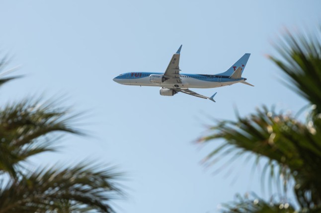 A commercial flight of TUI Group airlines departs from