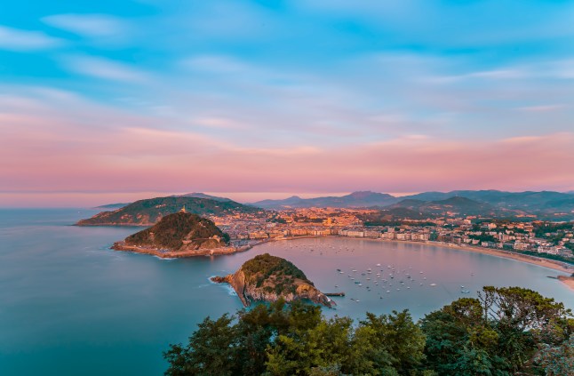 A sunset view of La Concha beach, Santa Clara island, Spain.