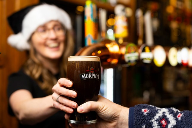 A pint of Murphy's Irish Stout is poured after being delivered by Heineken UK