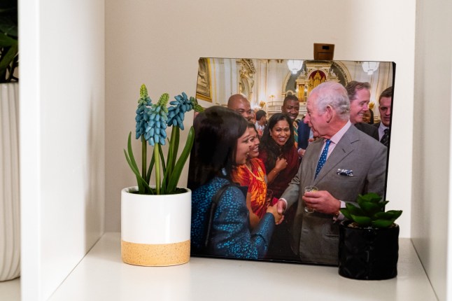 Swapna Narayanan of Rotherham What I own Feature bedroom with photo of King Charles 07 May 2025 Image Copyright P96
