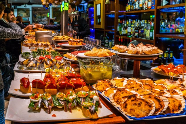 A tapas bar in San Sebastian with delicious pintxos, the traditional appetizers of the Basque country. San Sebastian, Basque Country, Spain, January 2019; Shutterstock ID 1470095630; purchase_order: -; job: -; client: -; other: -