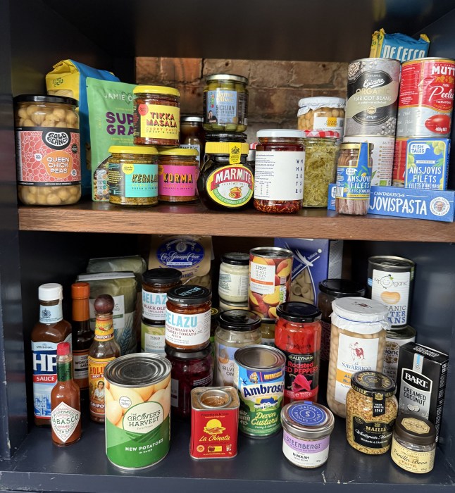 A look at what's inside Jamie Oliver's kitchen cupboard, including tinned new potatoes, Marmite and more