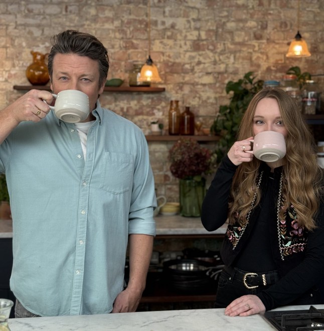 Jamie Oliver and Courtney Pochin drinking tea in his kitchen at Jamie Oliver HQ